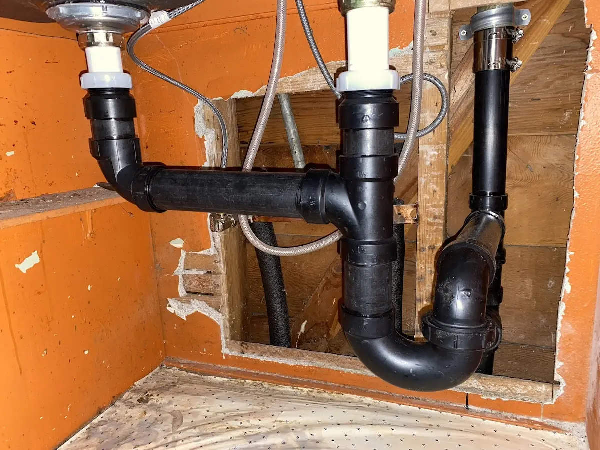 Professional Garbage Disposal Repair equipment and tools on the job in Warren